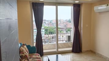 Deluxe Double Room, Balcony, Garden View | Desk, laptop workspace, free WiFi