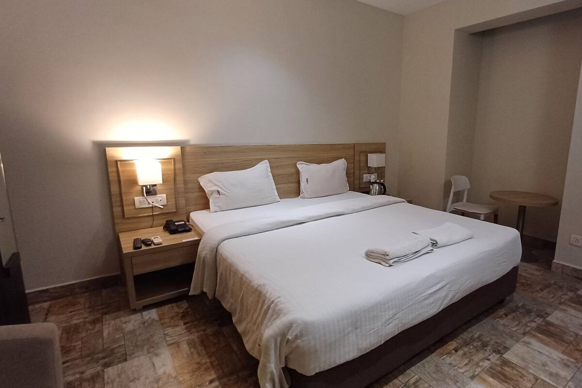 Desk, laptop workspace, free WiFi, bed sheets