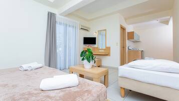 Triple Studio with Double Bed | In-room safe, blackout drapes, iron/ironing board (on request)
