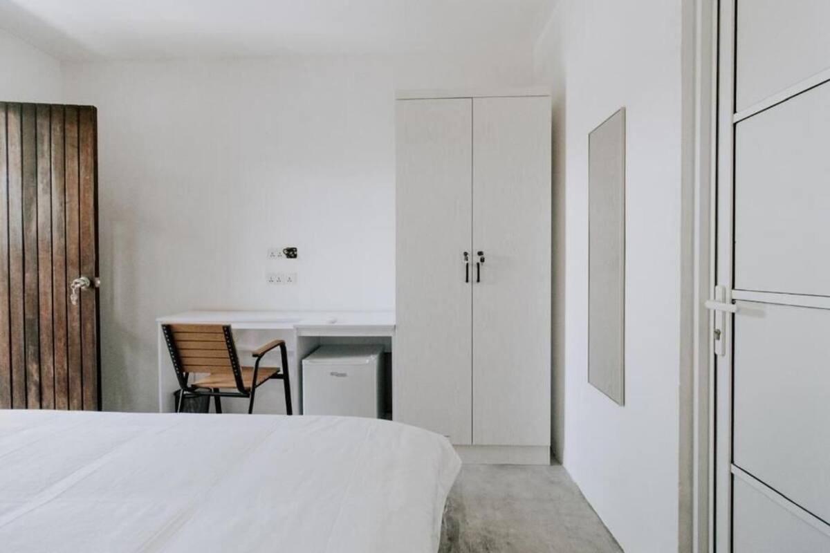 Deluxe Quadruple Room, Garden View | Desk, free WiFi