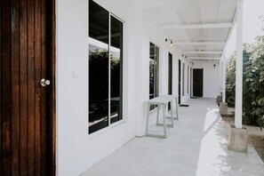 Deluxe Quadruple Room, Garden View | Desk, free WiFi