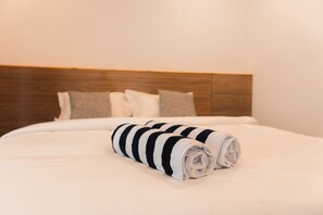 Deluxe Quadruple Room, Garden View | Desk, free WiFi