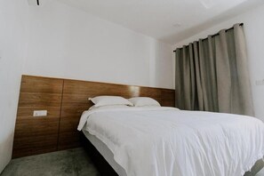 Deluxe Double Room, Garden View | Desk, free WiFi