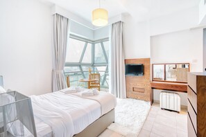 Exclusive Apartment, Balcony, City View | In-room safe, blackout drapes, free WiFi - PVH - Exquisite 1BR - Diamond Tower (Dubai)