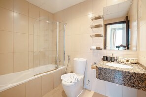 Exclusive Apartment, Balcony, City View | Bathroom | Combined shower/tub, hair dryer, towels, soap - PVH - Exquisite 1BR - Diamond Tower (Dubai)