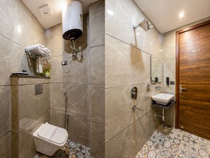 Shower, free toiletries, slippers, towels