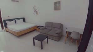 Economy Studio, City View | Living area