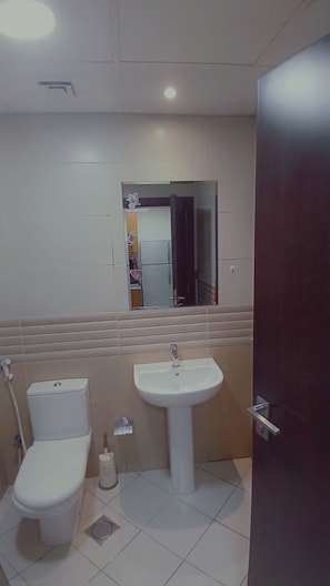 Economy Studio, City View | Bathroom | Combined shower/tub, towels, soap, shampoo