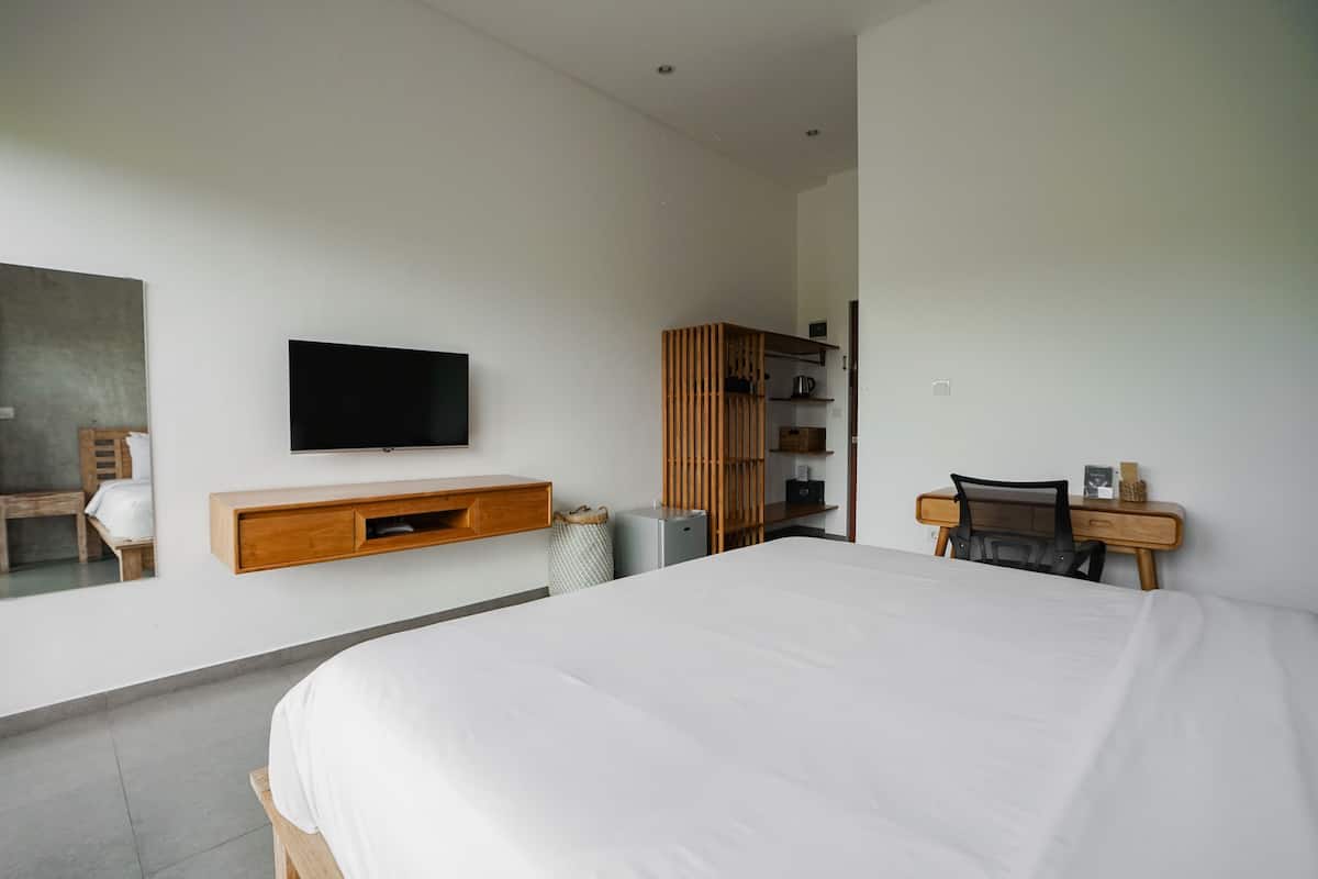 Deluxe Double Room, Balcony, Garden View | In-room safe, desk, laptop workspace, free WiFi