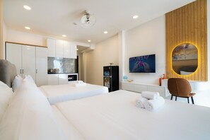 Quadruple Room, Balcony | In-room safe, desk, laptop workspace, blackout drapes