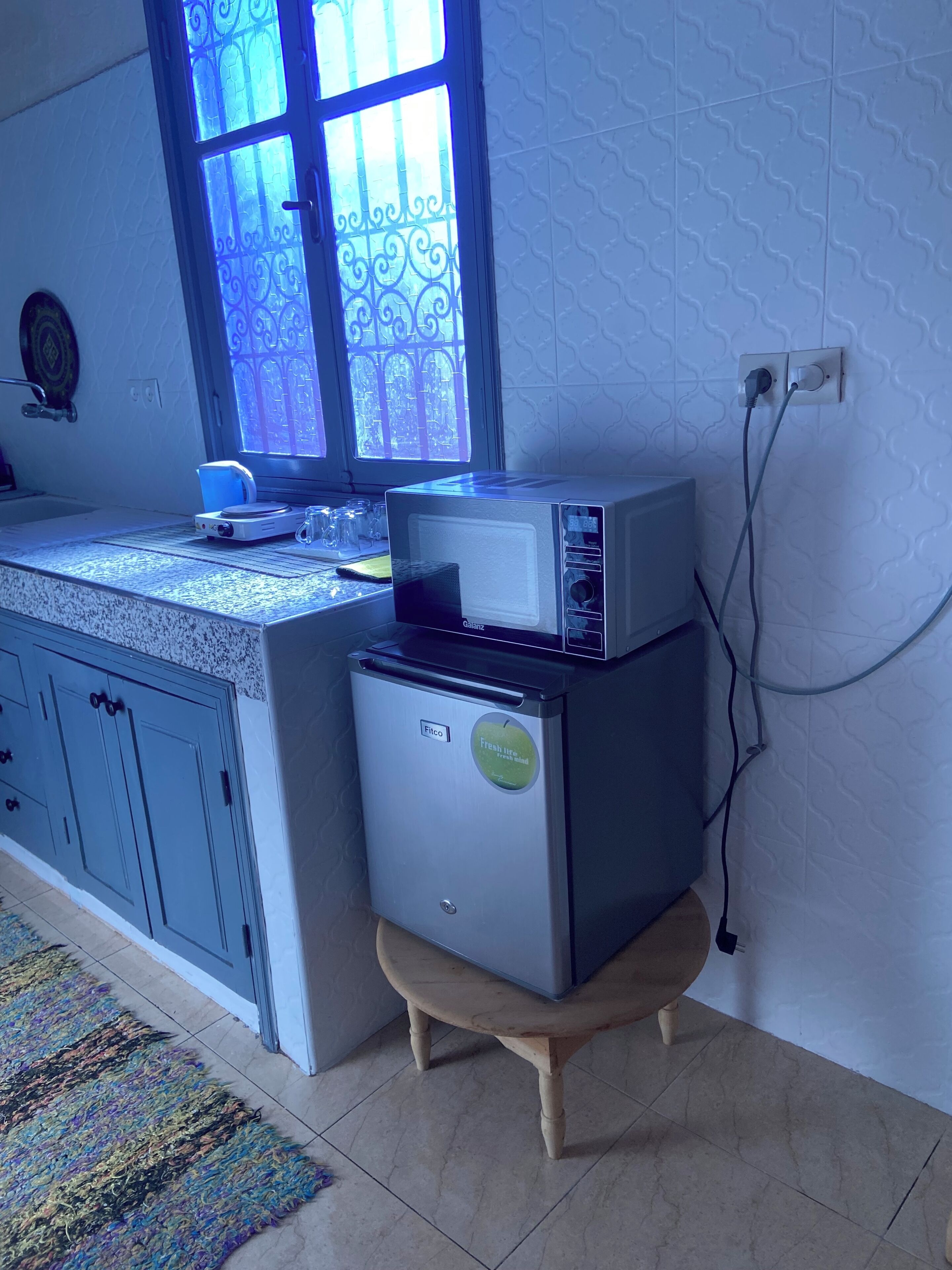 Microwave, stovetop, coffee/tea maker, electric kettle