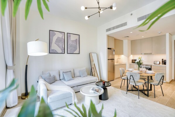 Premium Apartment, Balcony, City View | Living room | 55-inch Smart TV with digital channels