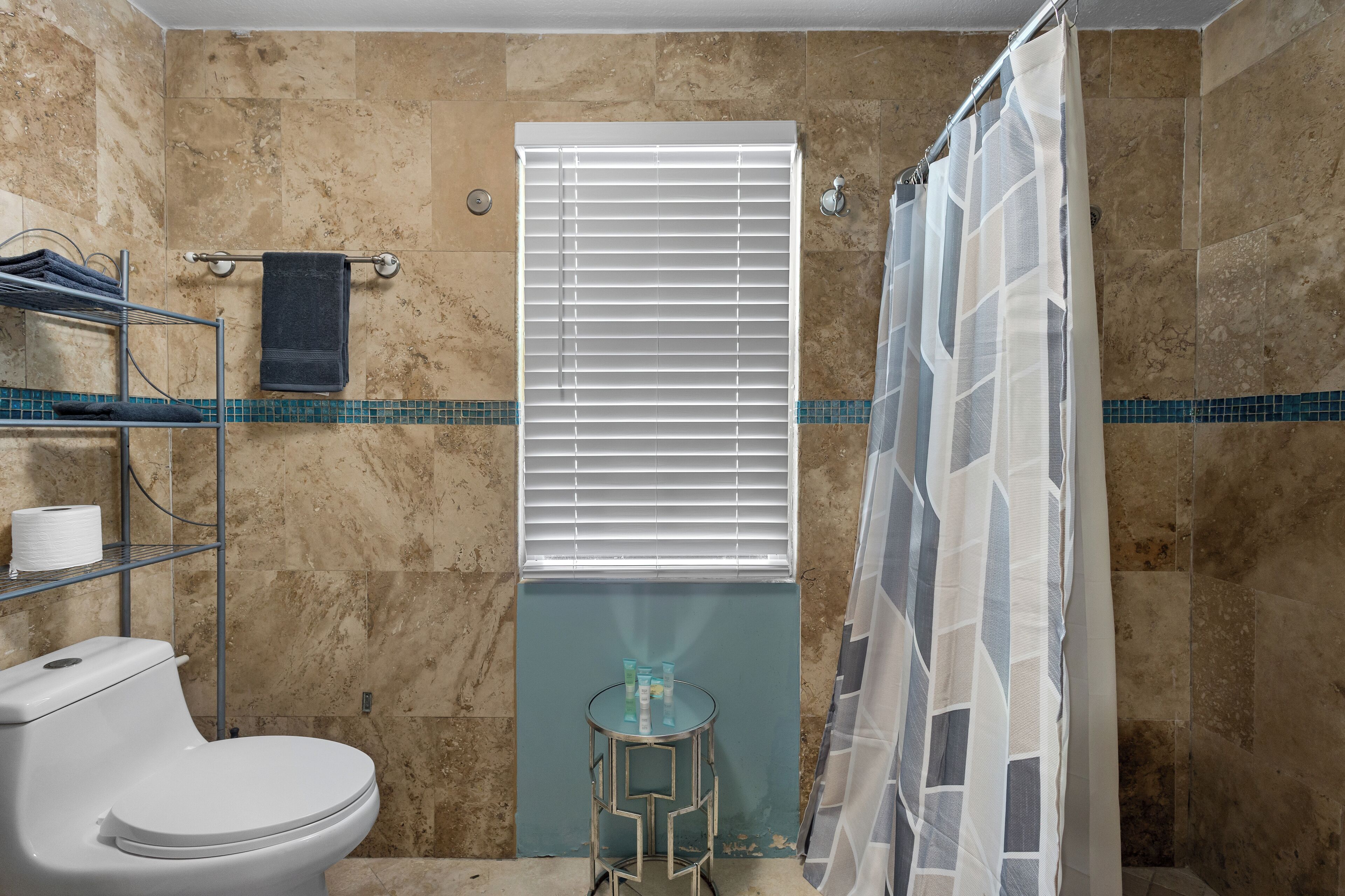 Hair dryer, towels, soap, toilet paper