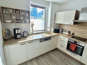 Microones, forn, placa de cuina i rentaplats