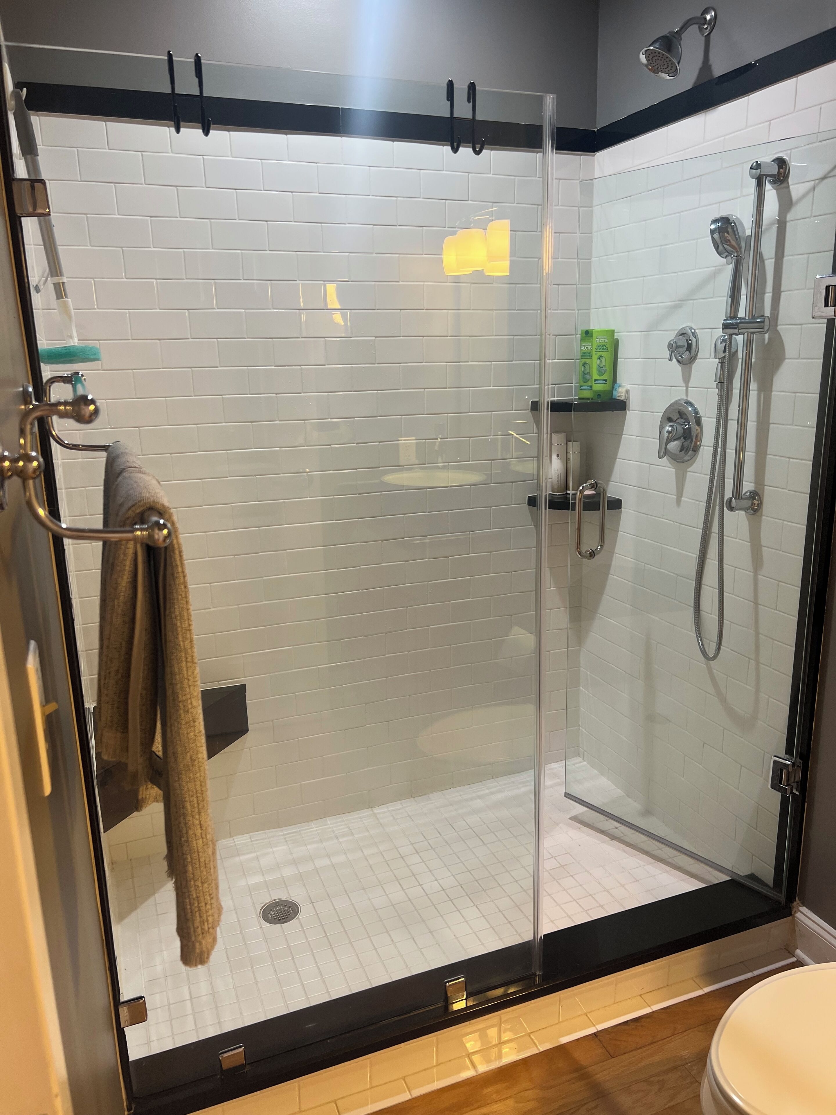 Hair dryer, towels, shampoo, toilet paper