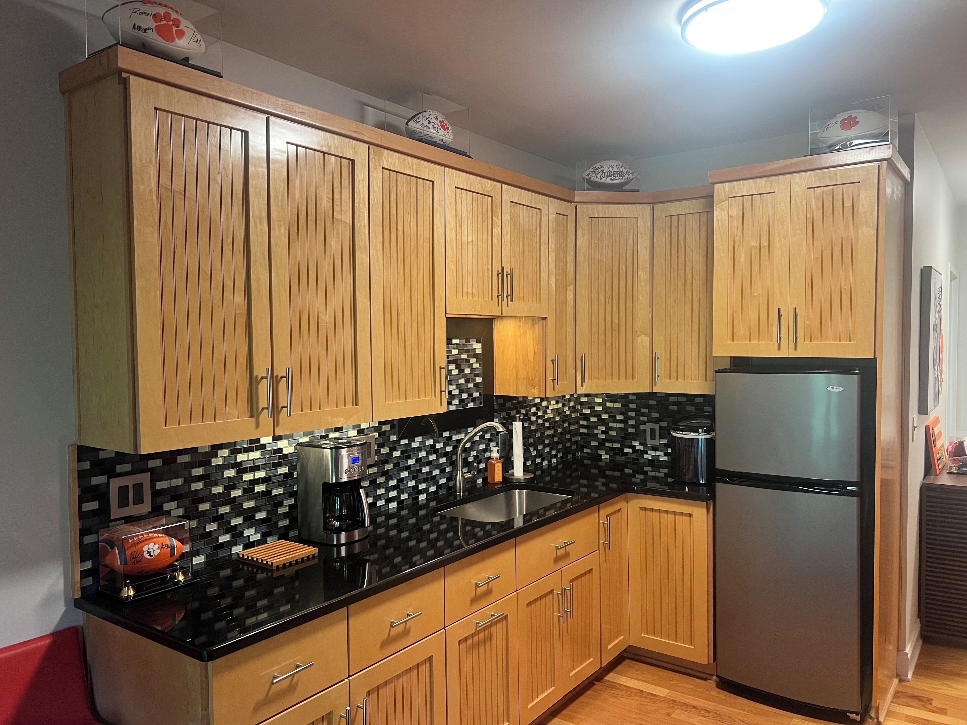 Fridge, microwave, coffee/tea maker, cookware/dishes/utensils