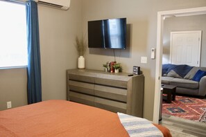1 bedroom, desk, iron/ironing board, travel crib