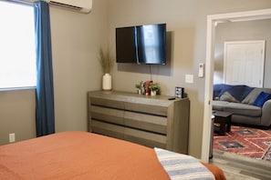 1 bedroom, desk, iron/ironing board, travel crib