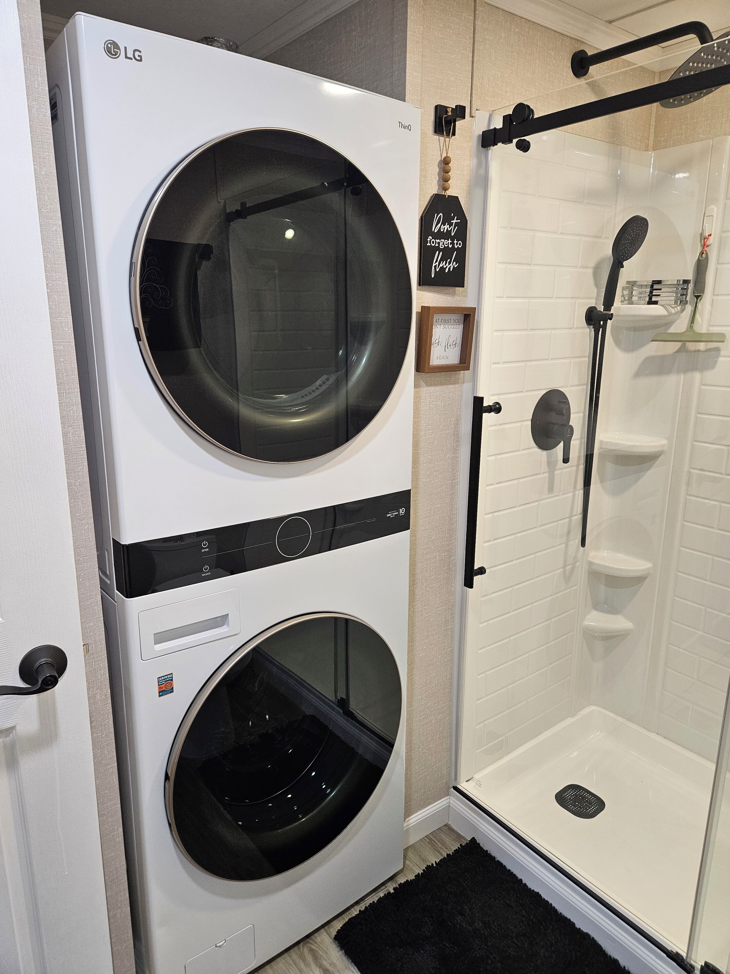 Shower, towels, soap, toilet paper