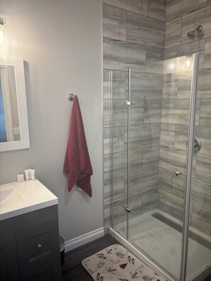 Shower, towels, soap, shampoo