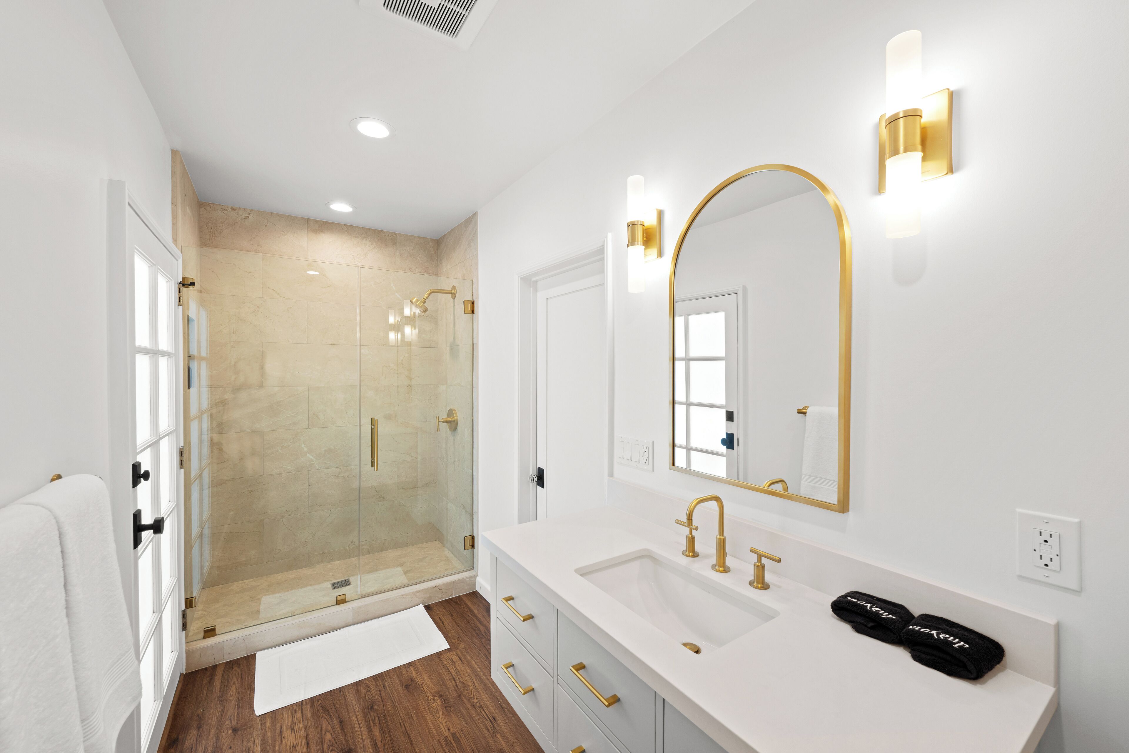 Shower, towels, soap, toilet paper
