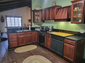 Fridge, microwave, coffee/tea maker, toaster