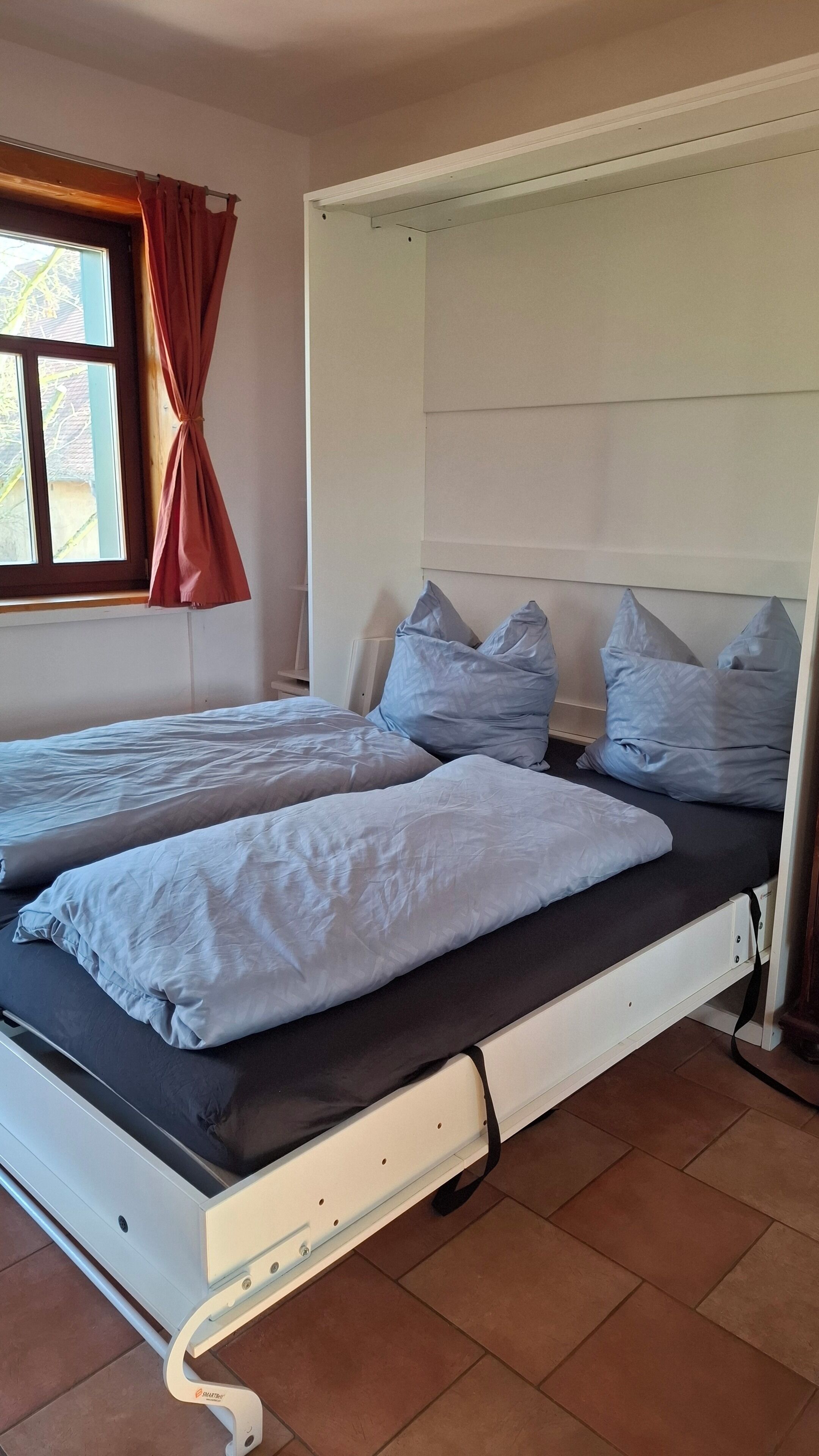 1 slaapkamer, een strijkplank/strijkijzer, wifi, beddengoed