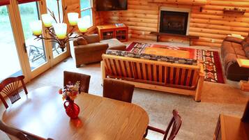 Smart TV, fireplace, books, computer monitors