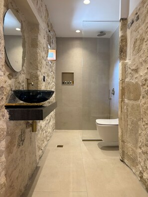 Shower, hair dryer, towels, soap - Authenticity and modern luxury combined together in the heart of Crete. (Orthes)
