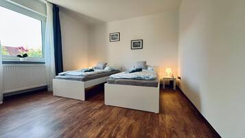 2 slaapkamers, een strijkplank/strijkijzer, wifi, beddengoed