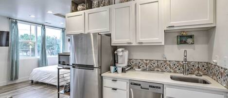 Fridge, microwave, stovetop, coffee/tea maker