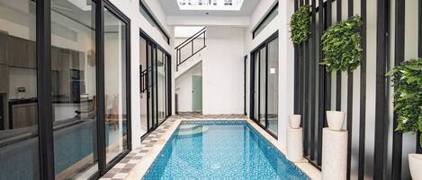 Deluxe Villa, Balcony, Pool View | Desk, laptop workspace, free WiFi