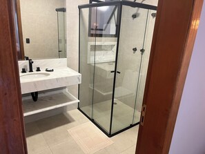 Shower, hair dryer, towels, soap