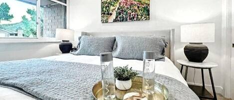 4 habitaciones, tabla de planchar con plancha y cuna de viaje