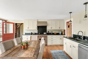 Fridge, microwave, cookware/dishes/utensils