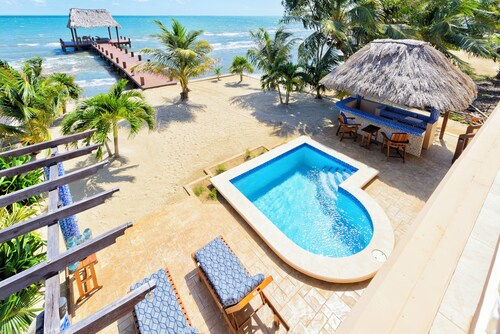Spectacular Oceanfront 3/3 Villa with Private Beach, Pool, and 
FREE GOLF CART!