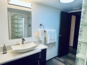 Shower, hair dryer, towels, soap
