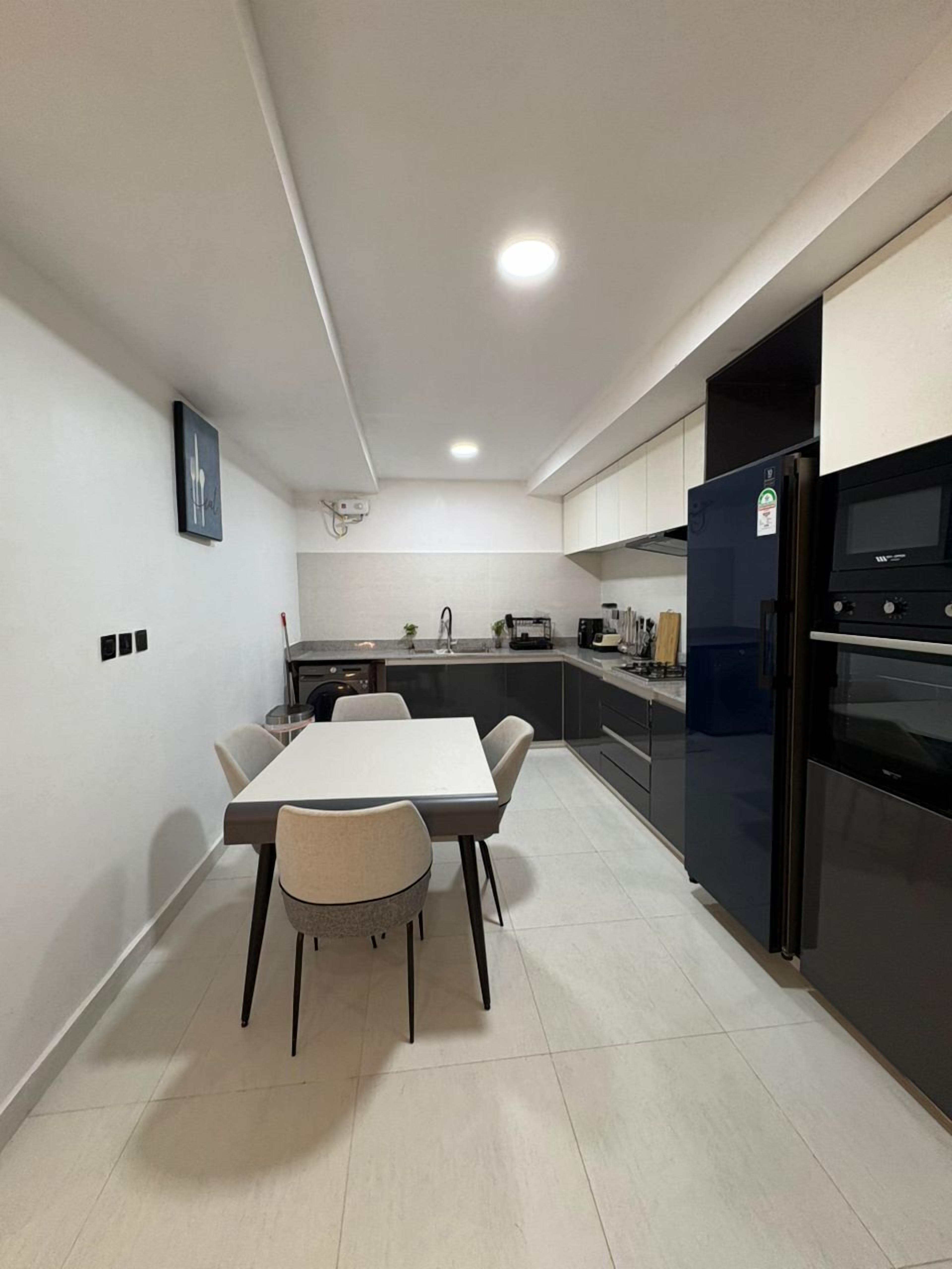 Luxury Apartment, Balcony, Courtyard View | Private kitchen | Full-sized fridge, microwave, oven, stovetop