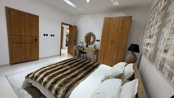 Luxury Apartment, Balcony, Courtyard View | Desk, laptop workspace, blackout drapes, soundproofing