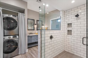 Shower, hair dryer, towels, soap