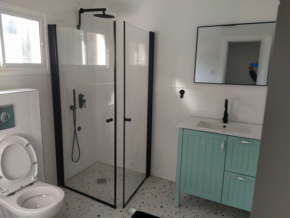 Hair dryer, towels, soap, toilet paper