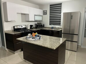 Fridge, microwave, oven, stovetop