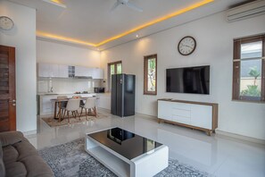 Premier Private Pool Villa | Living area | 50-inch LCD TV with digital channels