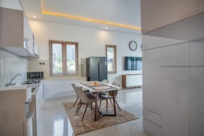 Premier Private Pool Villa | Living area | 50-inch LCD TV with digital channels