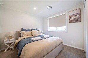 4 bedrooms, desk, iron/ironing board, travel crib