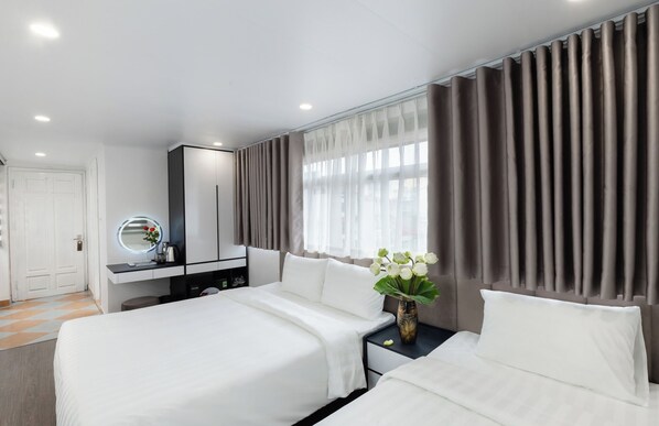 Deluxe Triple Room, City View