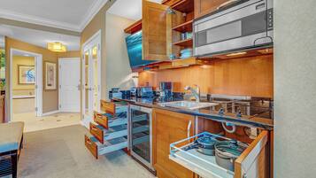 Fridge, microwave, stovetop, coffee/tea maker