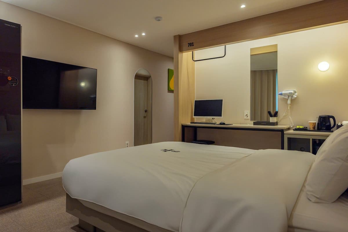 Deluxe Double Room | Premium bedding, laptop workspace, soundproofing, free WiFi