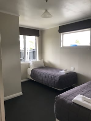 Apartamento | Tabla de planchar con plancha, wifi gratis, ropa de cama