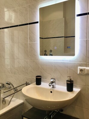 Hair dryer, towels, soap, shampoo